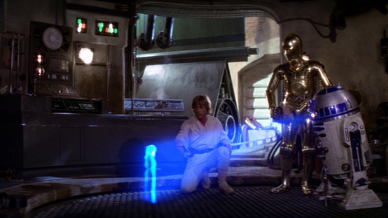 Mark Hamill, Anthony Daniels e Kenny Baker in una scena di Star Wars: Una nuova speranza