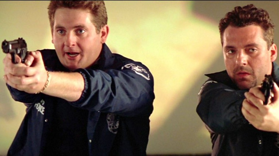 Chris Penn e Tom Sizemore in una scena di Una vita al massimo