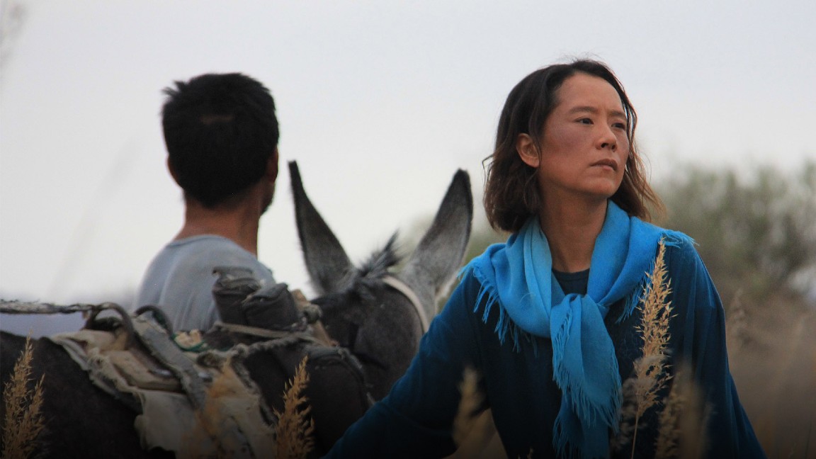 Hai Qing e Wu Menlin in una scena di Terra e Polvere